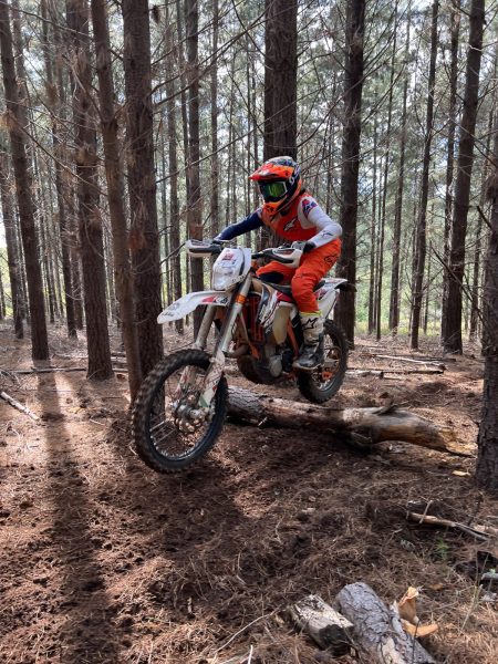 Open field dirt track near a lake